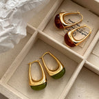 Amber Olive Resin Teardrop Earrings - Gold Framed Studs