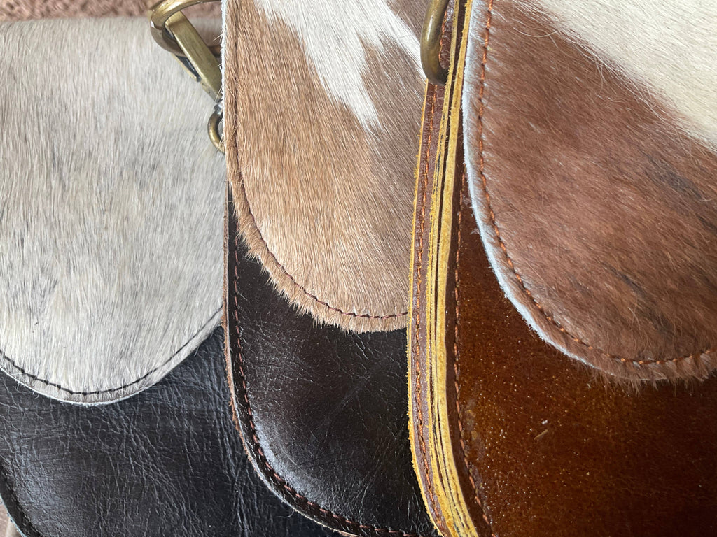 The English Saddle Cowhide Crossbody